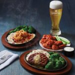 Applebee's debuts two new Sizzlin' Skillets: the NEW Garlic Sirloin Skillet and the NEW White Cheddar Bacon & Chicken Skillet as part of its 2 for $25 menu, for a limited time